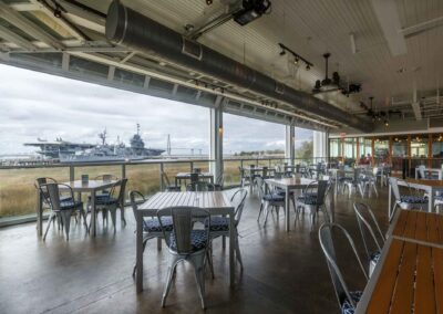 View of the USS Yorktown from inside the Fish House Restaurant.